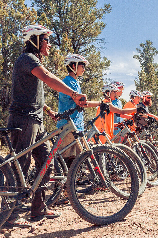 Being out doors on bikes out in the wilderness