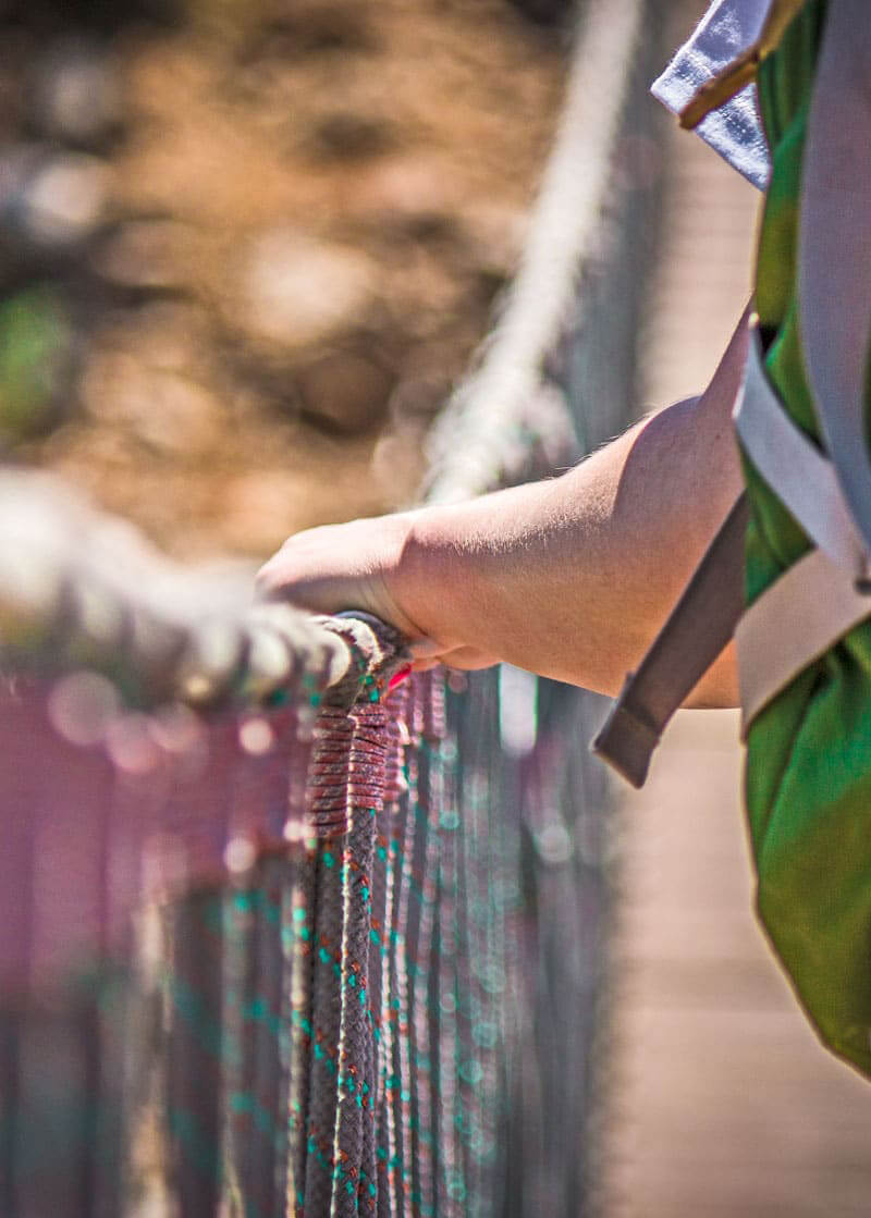 Teen Walking Over A Rope Bridge at redcliff ascent wilderness therapy program